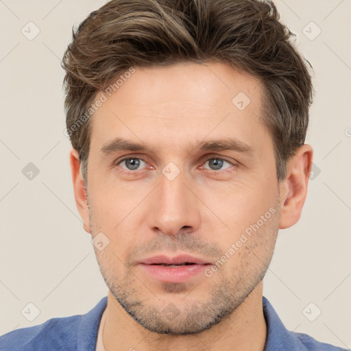 Neutral white young-adult male with short  brown hair and brown eyes