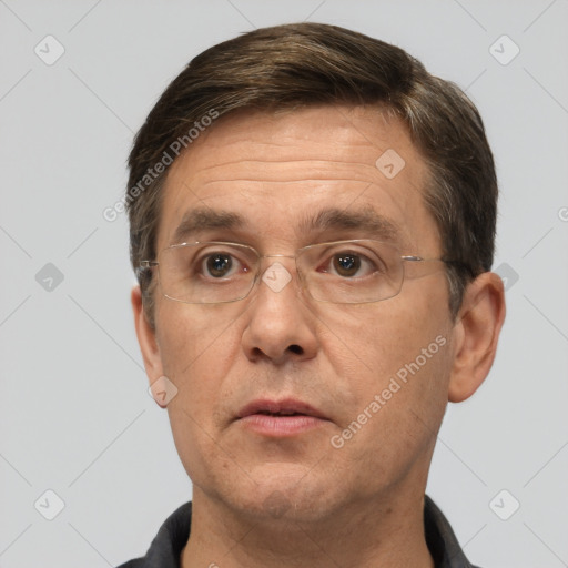 Neutral white adult male with short  brown hair and brown eyes