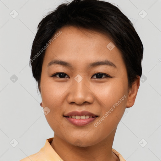 Joyful asian young-adult female with short  black hair and brown eyes