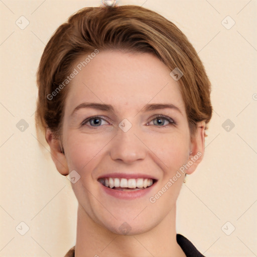 Joyful white young-adult female with short  brown hair and grey eyes