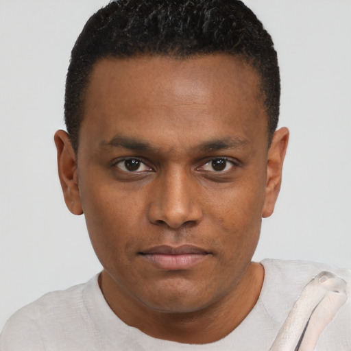 Neutral black young-adult male with short  brown hair and brown eyes