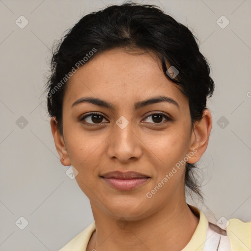 Joyful latino young-adult female with short  brown hair and brown eyes