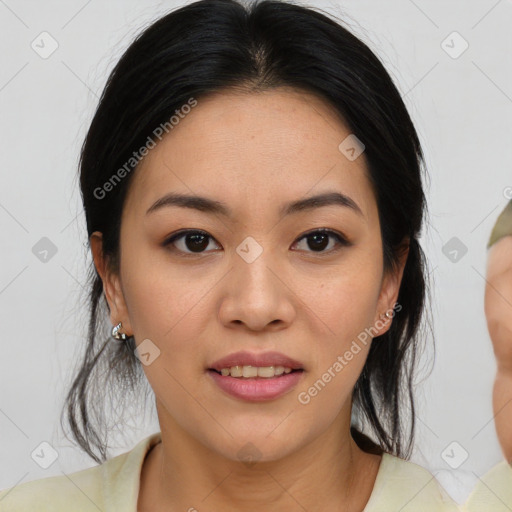 Joyful asian young-adult female with medium  black hair and brown eyes