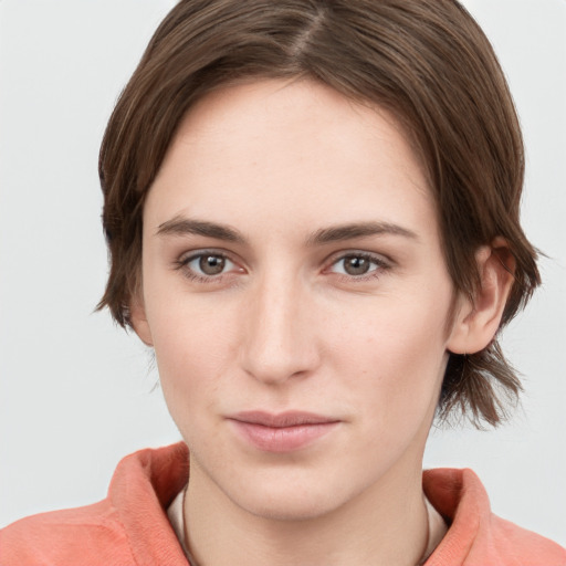 Neutral white young-adult female with medium  brown hair and grey eyes