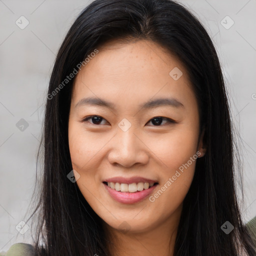 Joyful asian young-adult female with long  brown hair and brown eyes