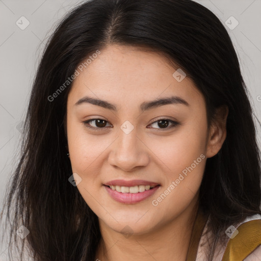 Joyful asian young-adult female with long  brown hair and brown eyes