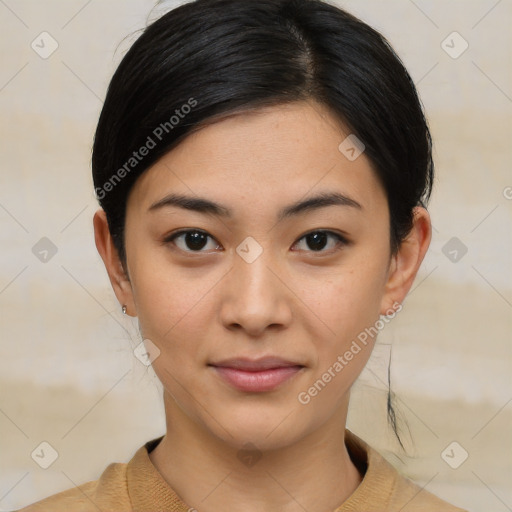 Joyful asian young-adult female with medium  black hair and brown eyes