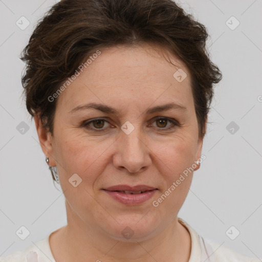 Joyful white adult female with short  brown hair and brown eyes