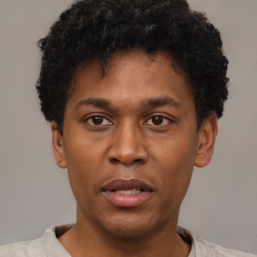 Neutral latino young-adult male with short  brown hair and brown eyes