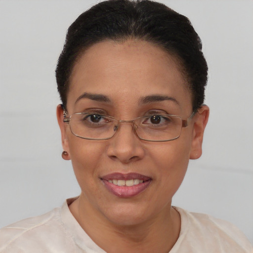 Joyful white adult female with short  brown hair and brown eyes
