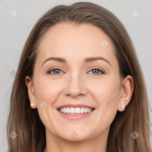 Joyful white young-adult female with long  brown hair and grey eyes