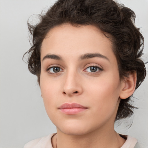 Neutral white young-adult female with medium  brown hair and brown eyes