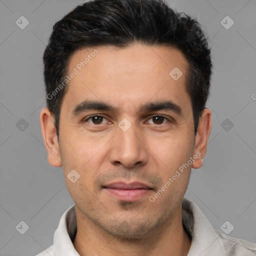 Joyful white young-adult male with short  black hair and brown eyes