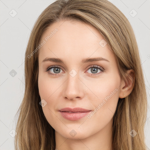 Joyful white young-adult female with long  brown hair and green eyes