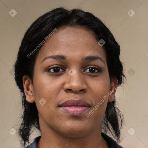 Joyful black young-adult female with medium  brown hair and brown eyes