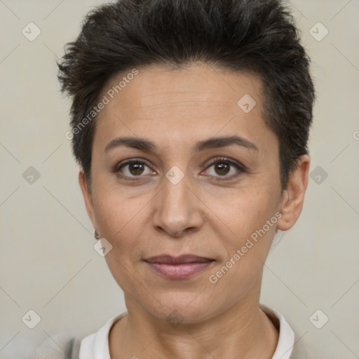 Joyful white adult female with short  brown hair and brown eyes