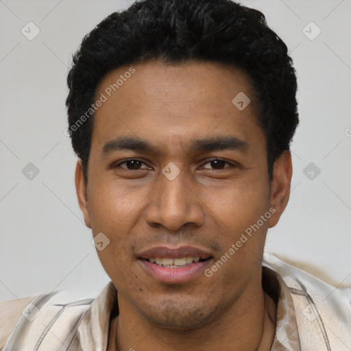Joyful latino young-adult male with short  black hair and brown eyes