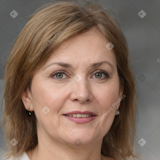 Joyful white adult female with medium  brown hair and grey eyes