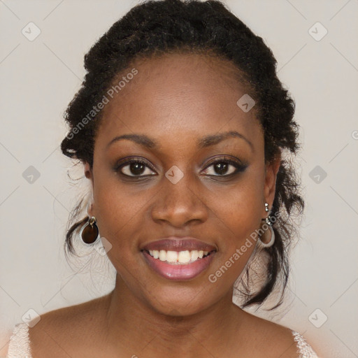 Joyful black young-adult female with long  brown hair and brown eyes