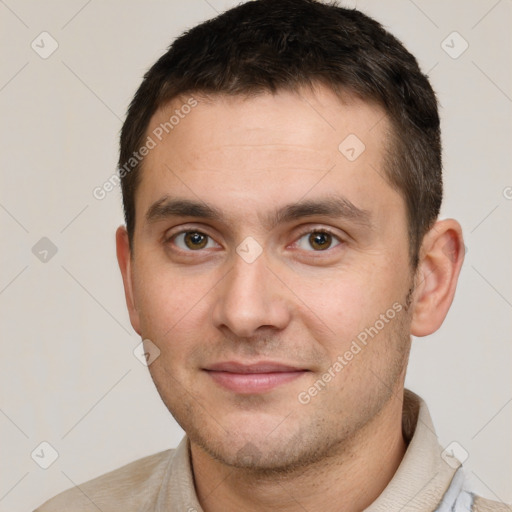 Joyful white young-adult male with short  brown hair and brown eyes