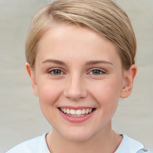 Joyful white young-adult female with short  brown hair and blue eyes