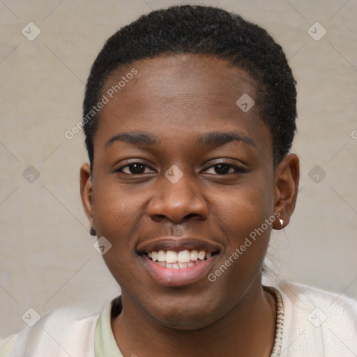 Joyful black young-adult female with short  brown hair and brown eyes