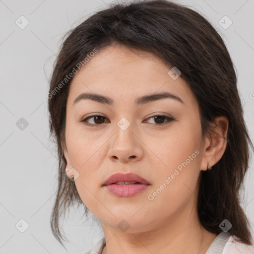 Joyful white young-adult female with medium  brown hair and brown eyes