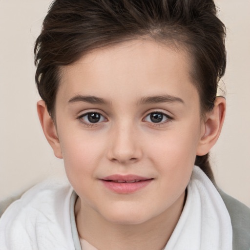 Joyful white child female with medium  brown hair and brown eyes