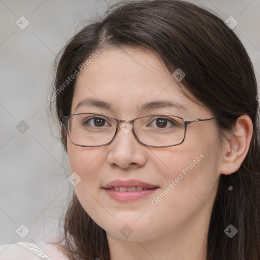 Joyful white adult female with medium  brown hair and brown eyes