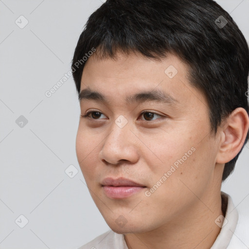 Neutral white young-adult male with short  black hair and brown eyes