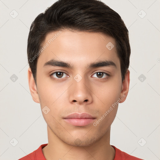 Neutral white young-adult male with short  brown hair and brown eyes