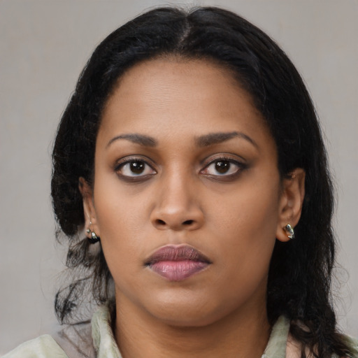 Neutral latino young-adult female with long  black hair and brown eyes