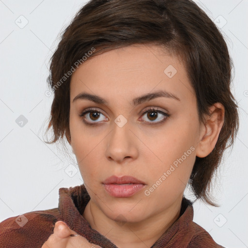 Neutral white young-adult female with medium  brown hair and brown eyes