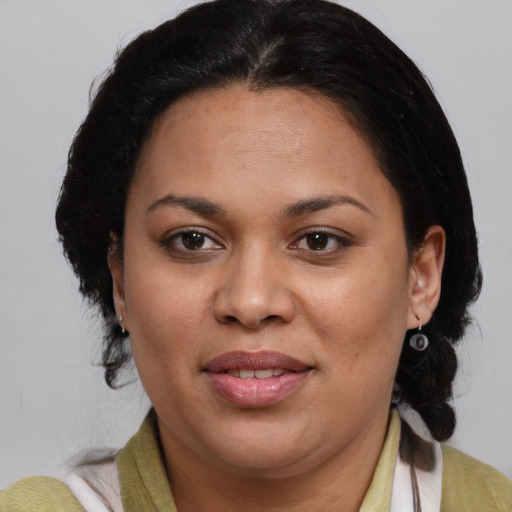 Joyful asian adult female with medium  brown hair and brown eyes