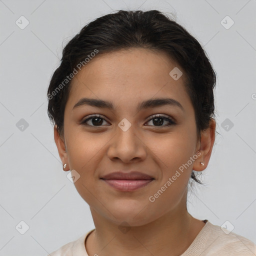 Joyful latino young-adult female with short  brown hair and brown eyes