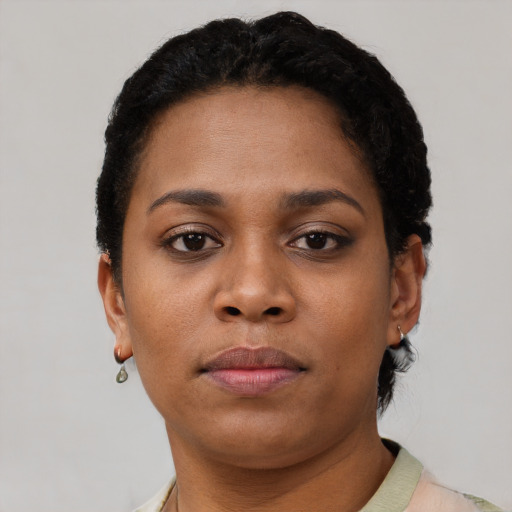 Neutral black young-adult female with short  brown hair and brown eyes