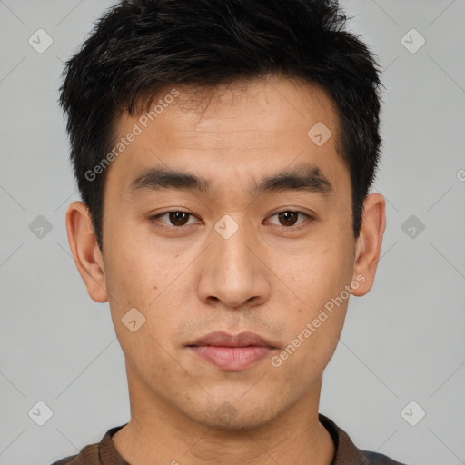 Neutral asian young-adult male with short  brown hair and brown eyes