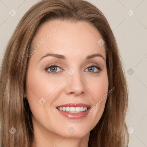 Joyful white young-adult female with long  brown hair and green eyes