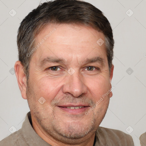 Joyful white adult male with short  brown hair and brown eyes