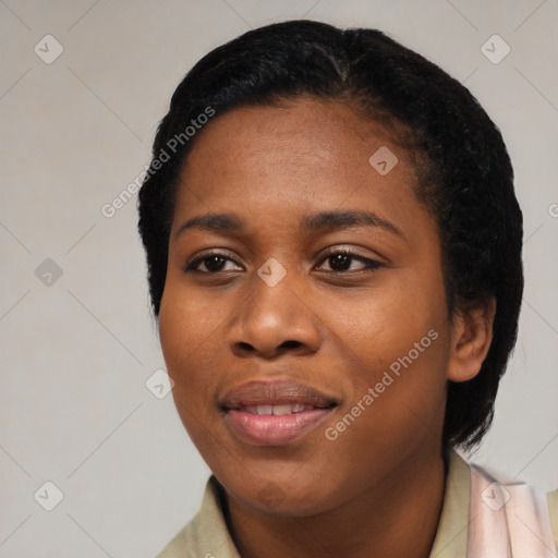 Joyful black young-adult female with medium  black hair and brown eyes