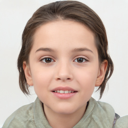 Joyful white child female with medium  brown hair and grey eyes