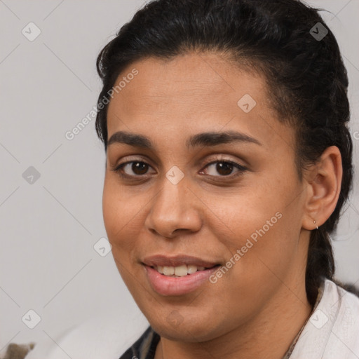 Joyful latino young-adult female with short  brown hair and brown eyes