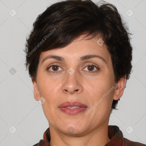 Joyful white adult female with short  brown hair and brown eyes