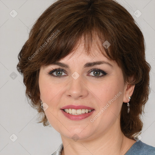 Joyful white young-adult female with medium  brown hair and blue eyes