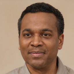 Joyful latino adult male with short  black hair and brown eyes