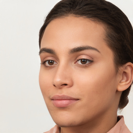 Neutral white young-adult female with short  brown hair and brown eyes