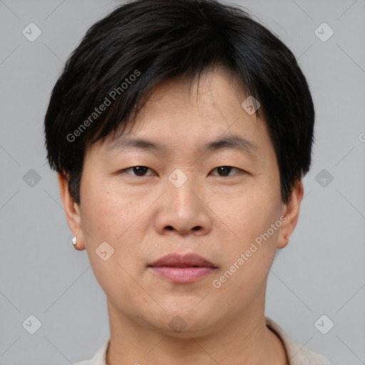 Neutral asian young-adult male with short  brown hair and brown eyes