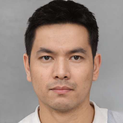Neutral asian young-adult male with short  black hair and brown eyes