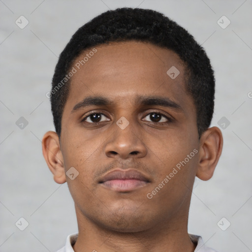 Neutral latino young-adult male with short  brown hair and brown eyes
