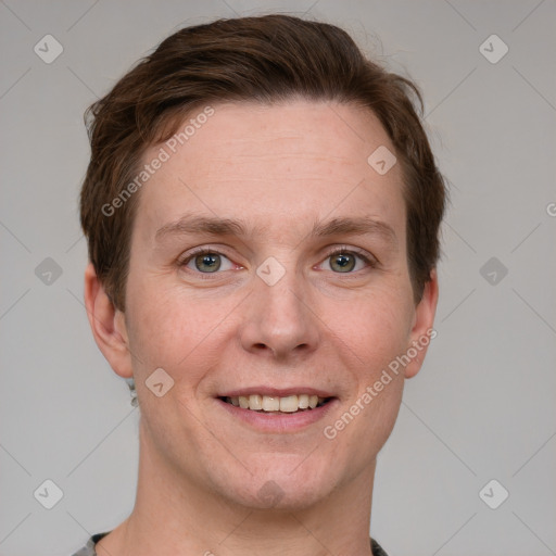 Joyful white adult female with short  brown hair and grey eyes